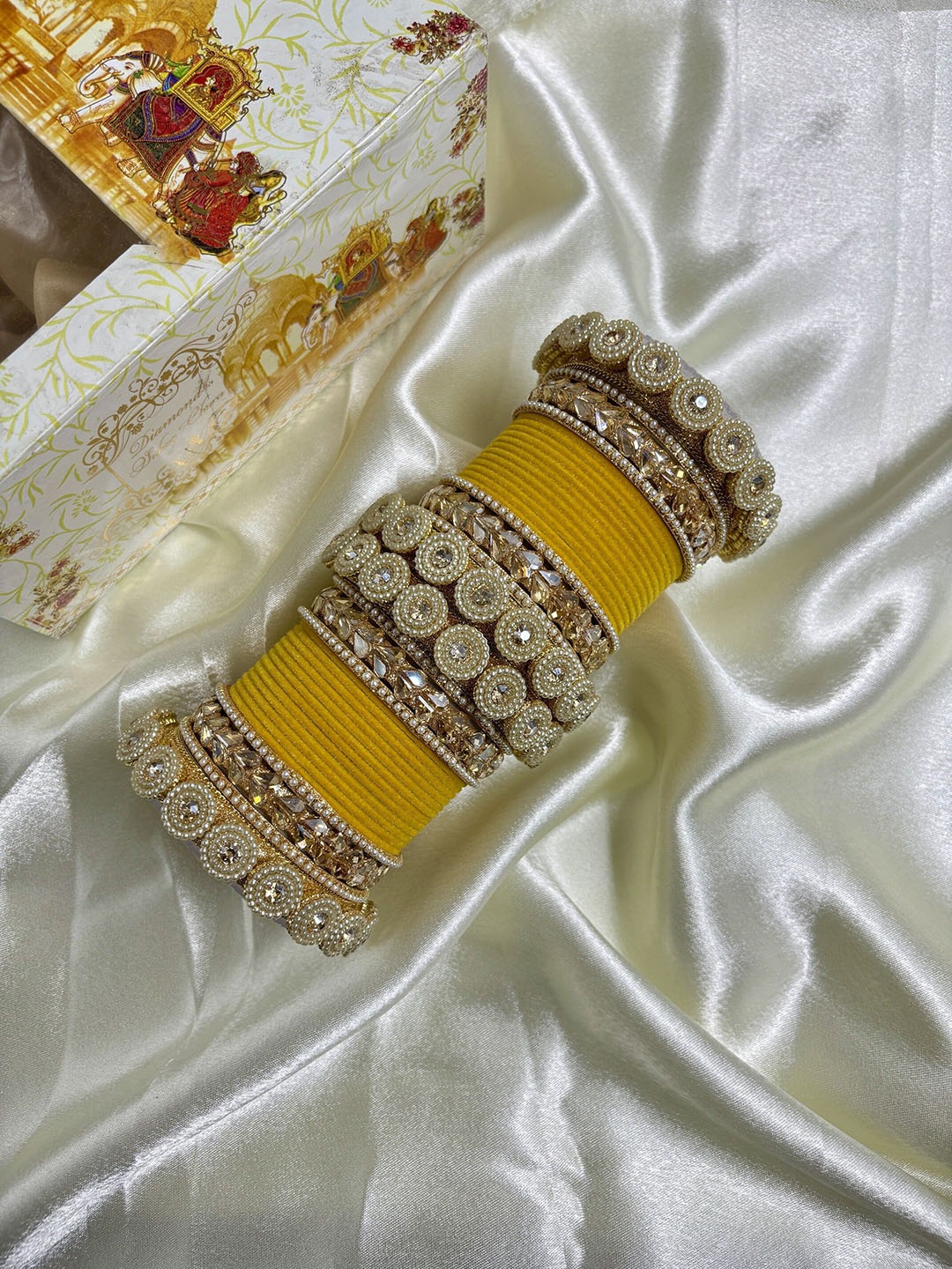 

Wedding Chuda by Hitesh Bangles Set Of 38 Stone Studded Bangles, Yellow
