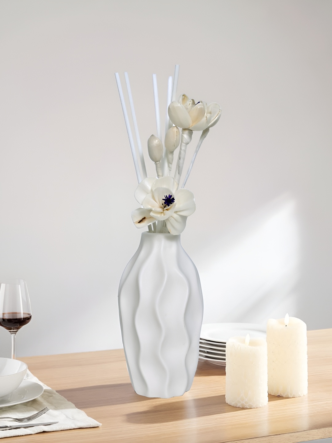 

Myntra Elegant Homes White Textured Ceramic FlowerVases
