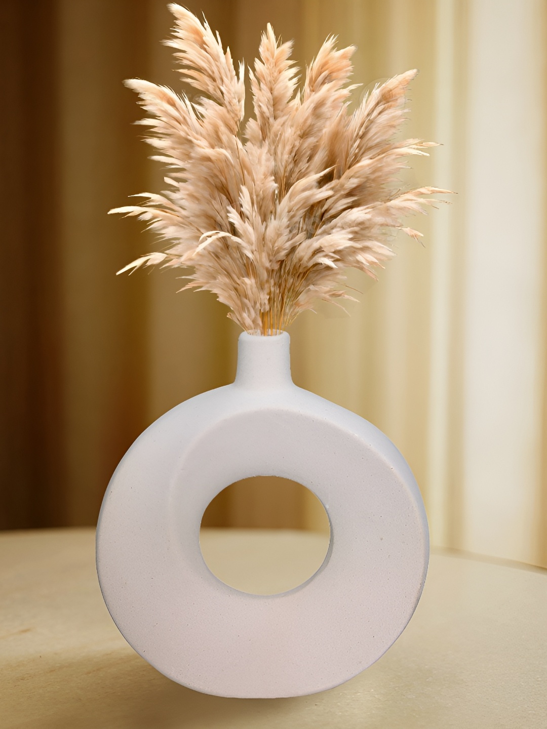 

Myntra Elegant Homes White Textured Ceramic FlowerVases