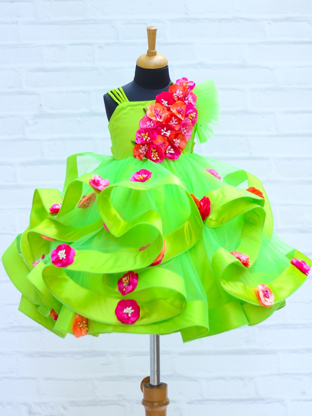 

Li & Li Boutique Girl Swirled One Shoulder Gown with Pink & Peach Flower Work, Green