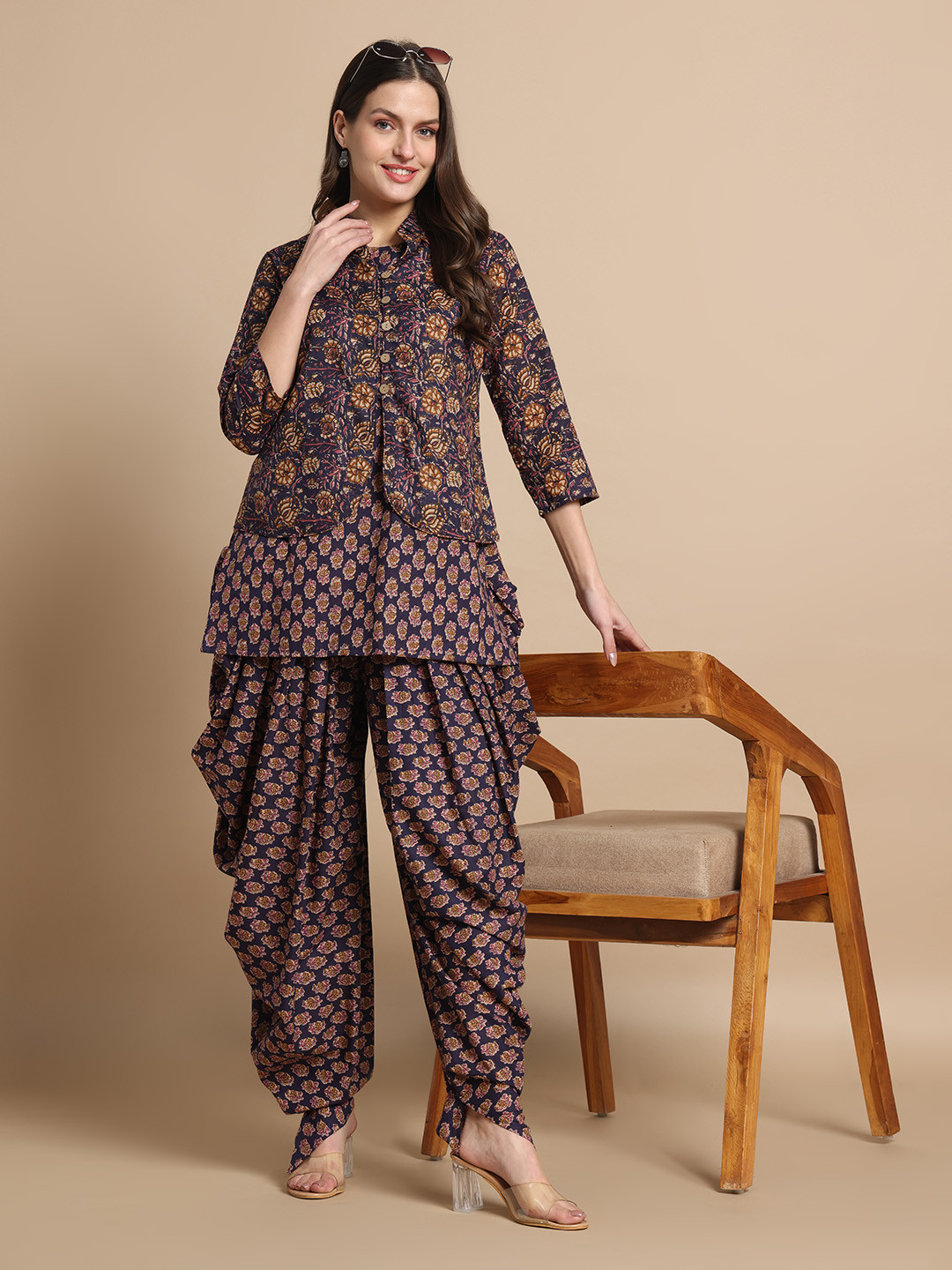 

Gujari Women Leheriya Printed Regular Pure Cotton Kurta with Dhoti Pants, Blue