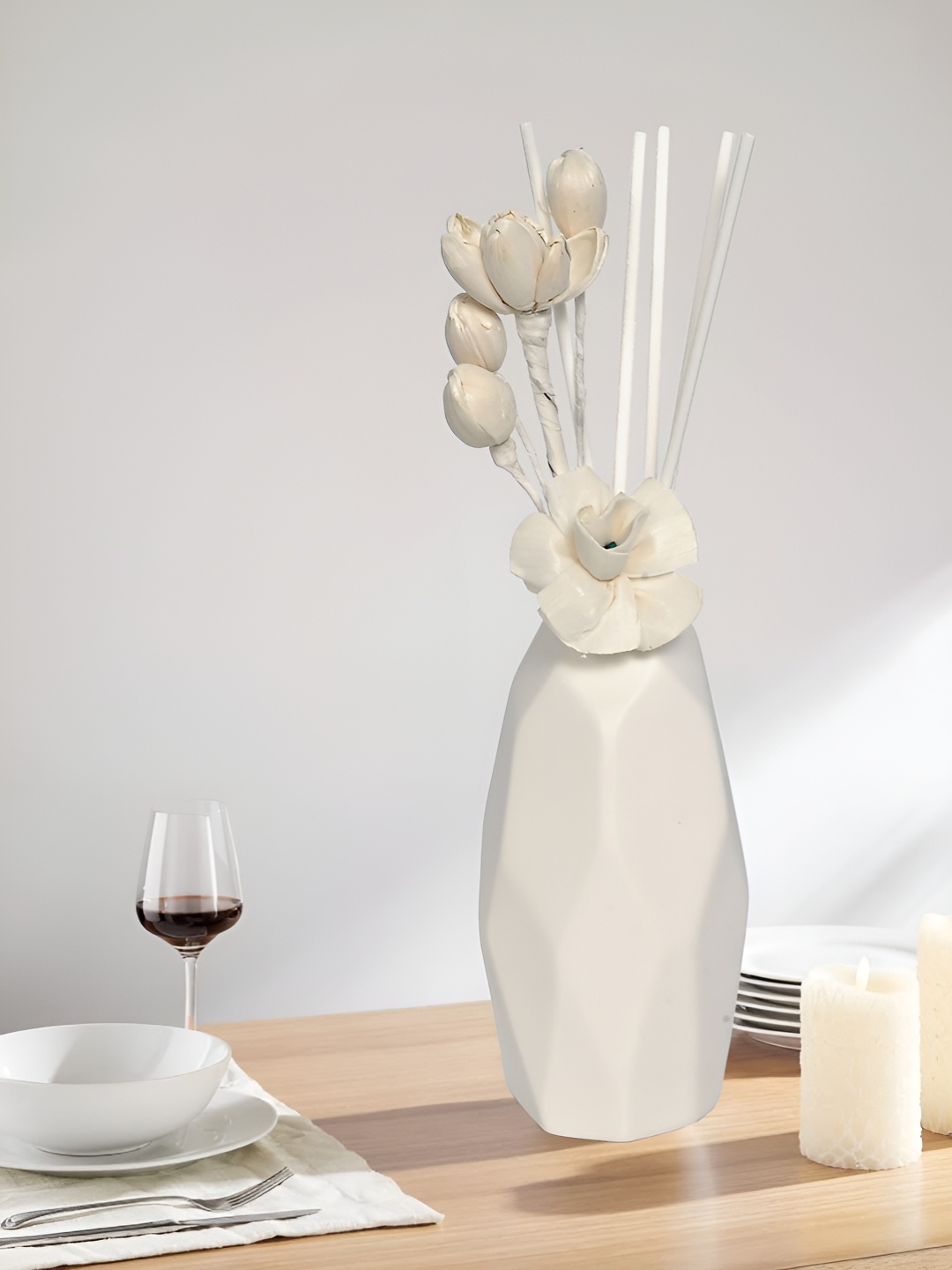 

Myntra Elegant Homes White Textured Ceramic FlowerVases