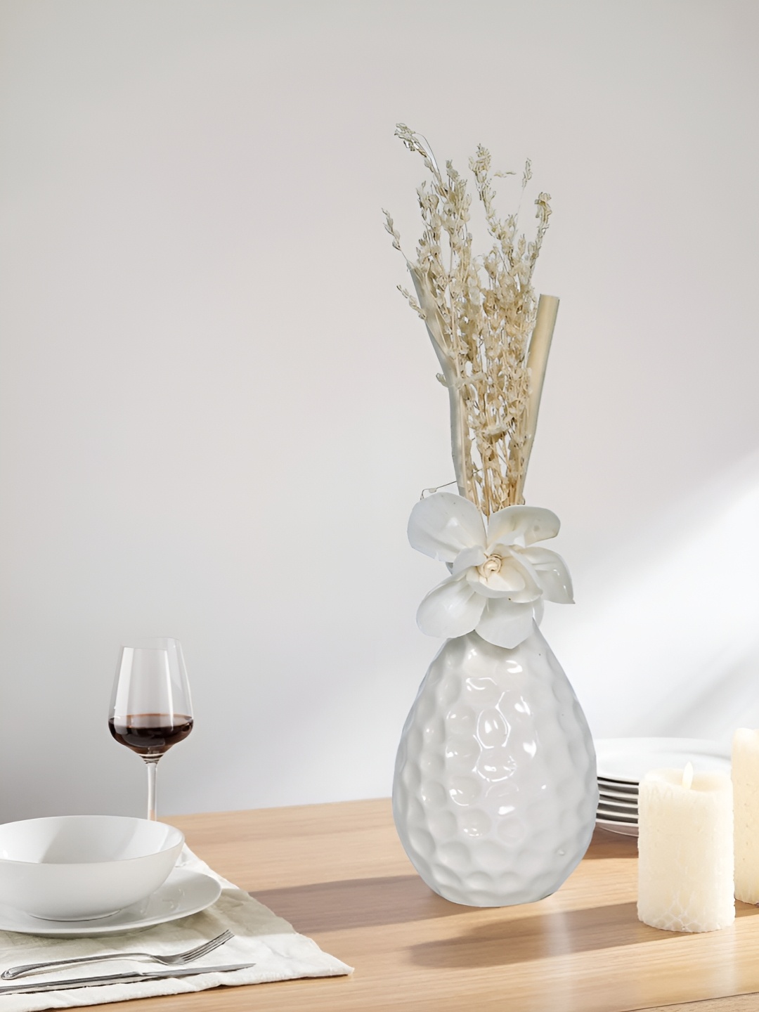 

Myntra Elegant Homes White Ceramic Textured FlowerVases