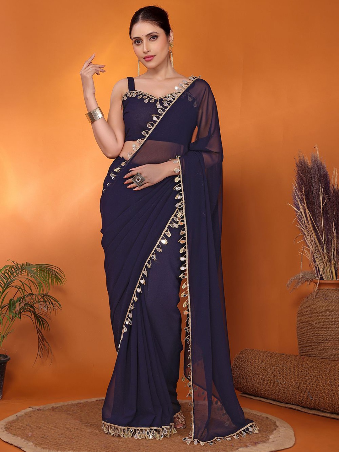 

FABMORA Embellished Mirror Work Pure Georgette Saree, Navy blue