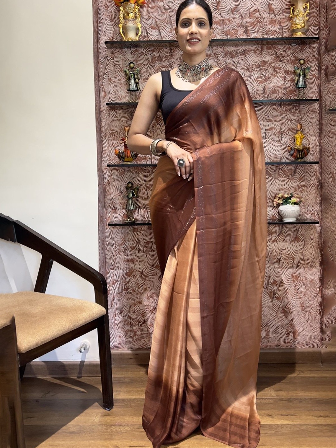 

Rangtulika Ethnics Colourblocked Poly Georgette Saree, Brown