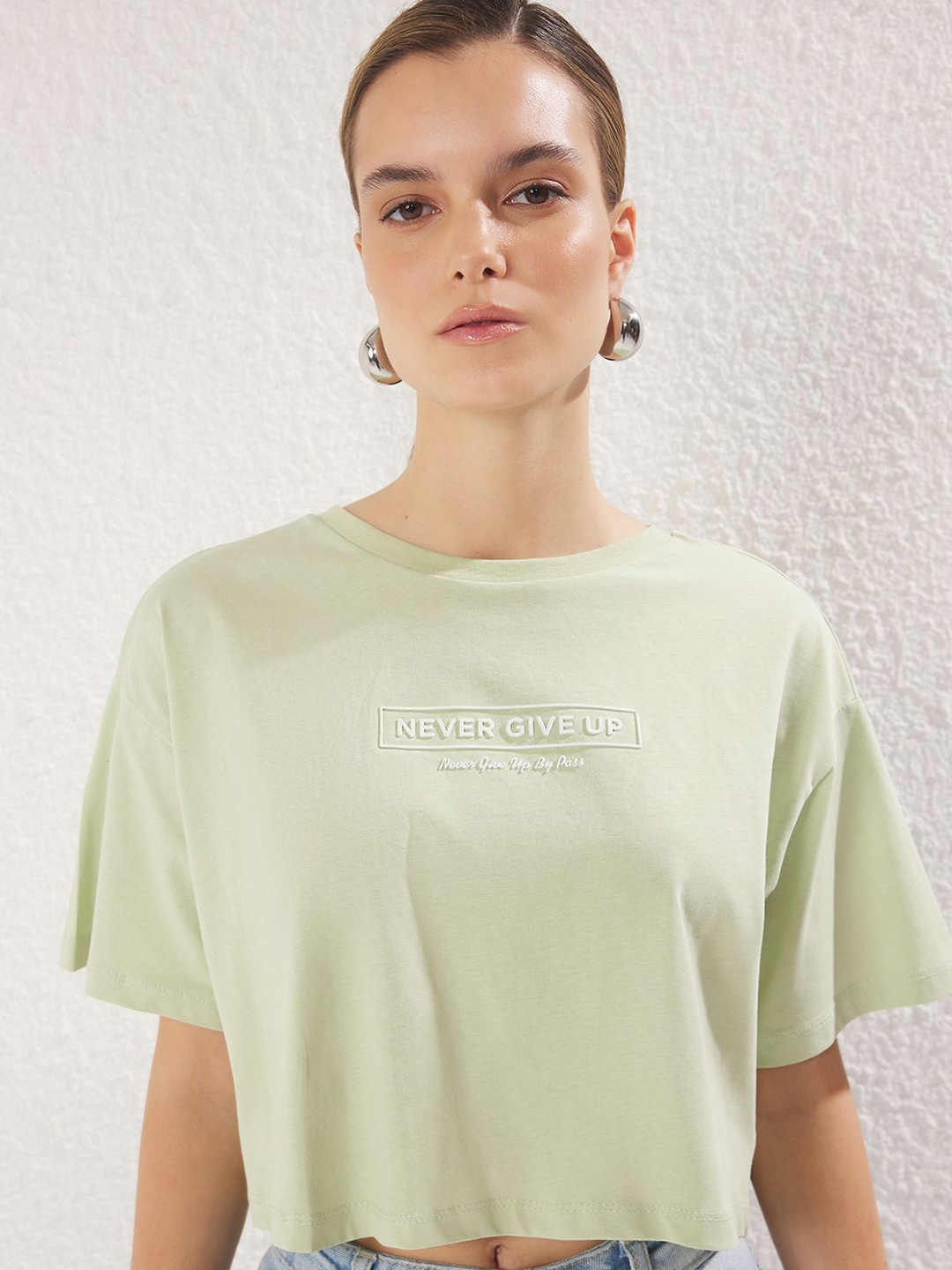 

Trendyol Women Typography Printed Extended Sleeves T-shirt, Na