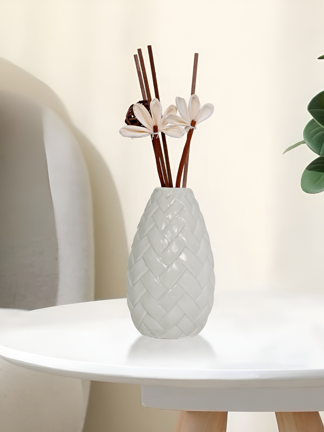 

Myntra Elegant Homes Grey Textured Ceramic FlowerVases
