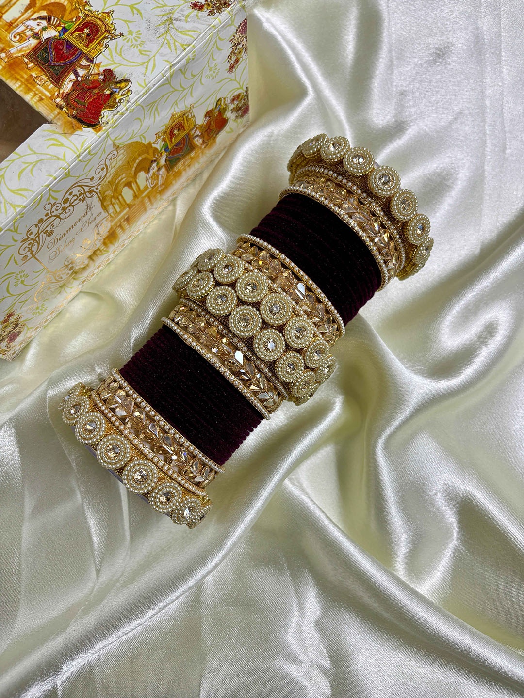 

Wedding Chuda by Hitesh Bangles Set Of 38 Stone Studded Bangles, Magenta