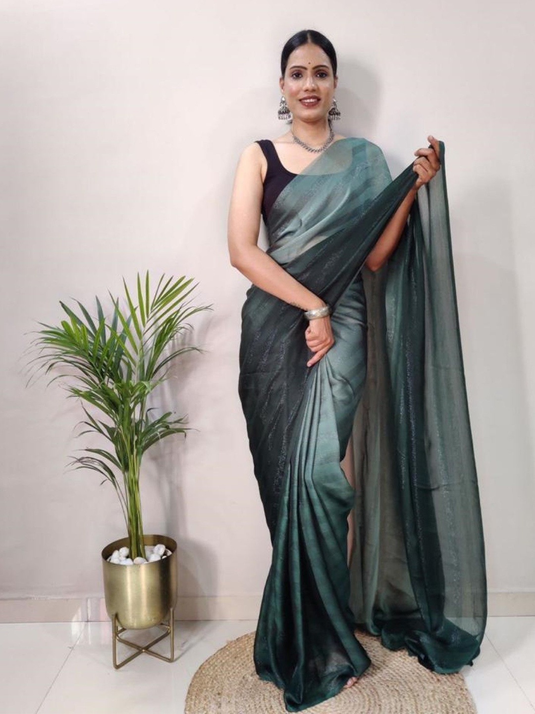 

Rangtulika Ethnics Striped Pure Georgette Ready to Wear Saree, Green
