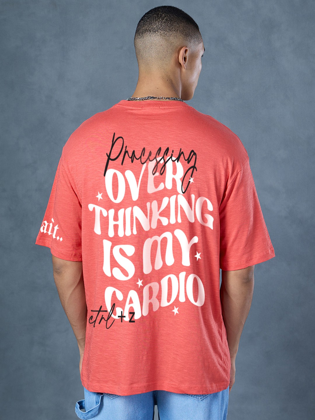 

Bewakoof AIR Men Typography Printed Round Neck Cotton Oversized T-shirt, Coral