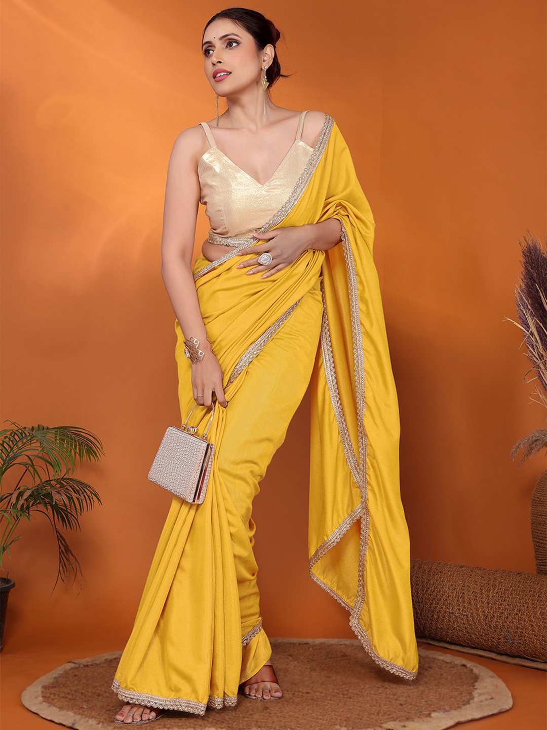

FABMORA Embellished Pure Georgette Saree, Yellow