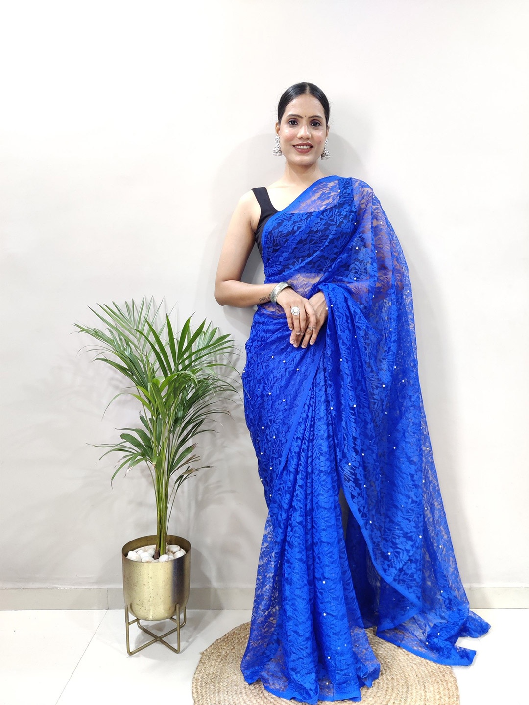 

Rangtulika Ethnics Floral Beads and Stones Net Saree, Blue