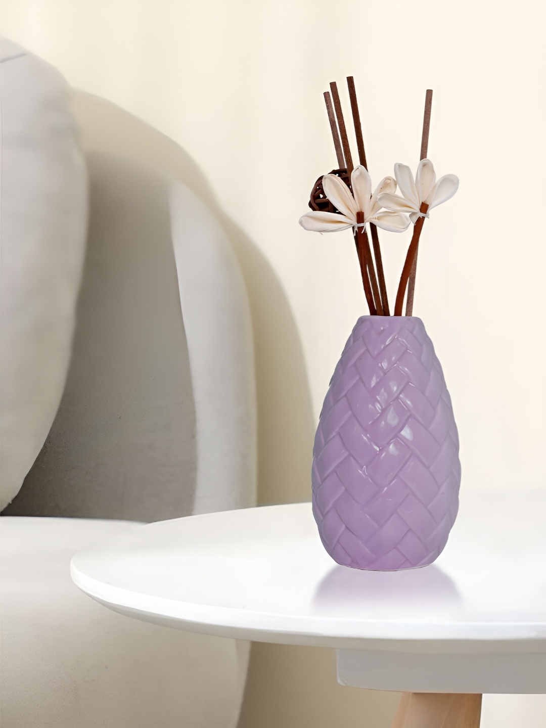 

Myntra Elegant Homes Purple Textured Ceramic FlowerVases