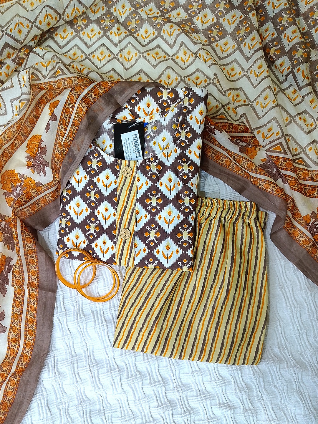 

Moda Rapido Women Ethnic Motifs Printed Regular Pure Cotton Kurta with Trousers & With Dupatta, Coffee brown