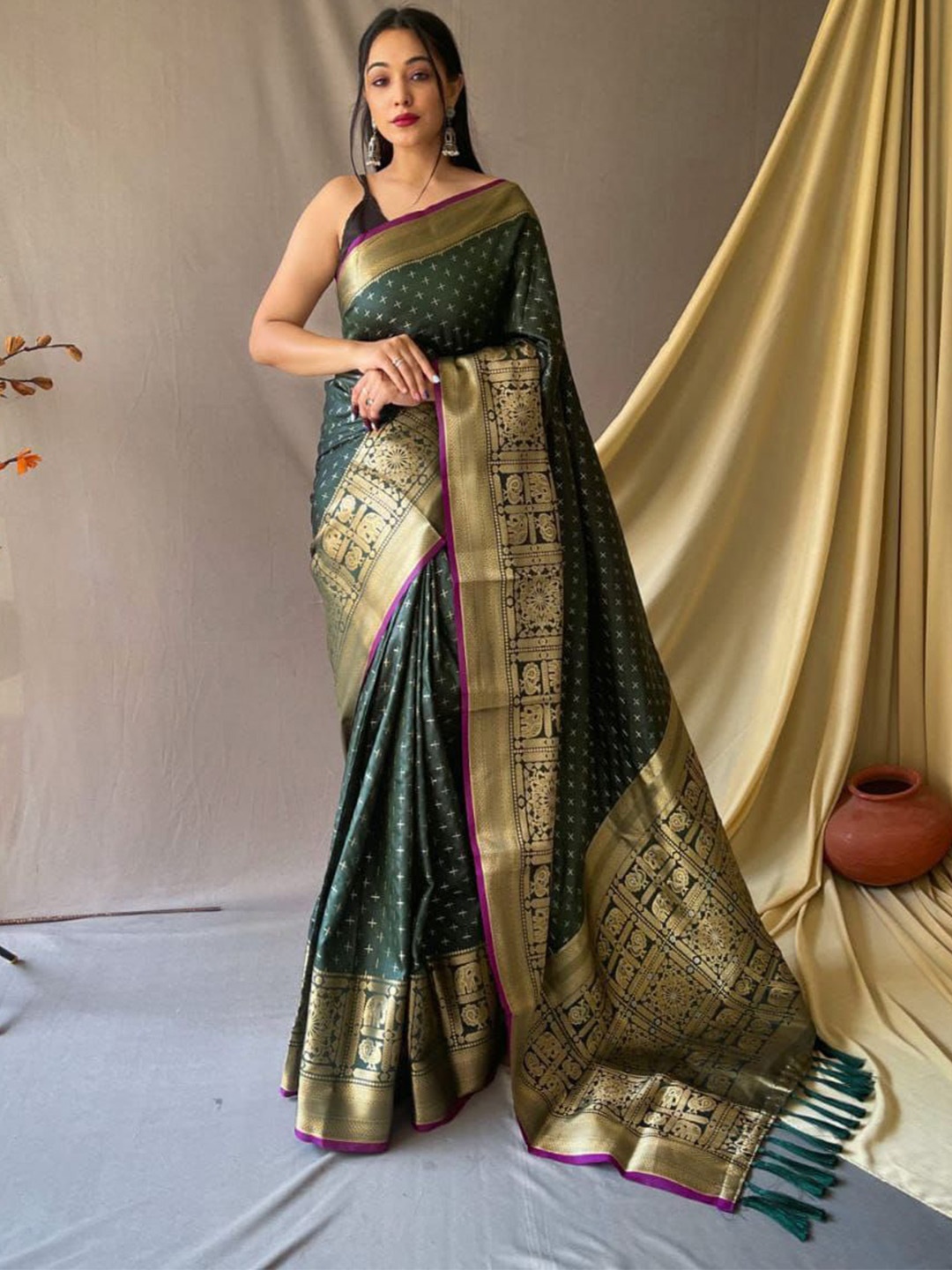 

Rangtulika Ethnics Woven Design Zari Silk Blend Saree, Green