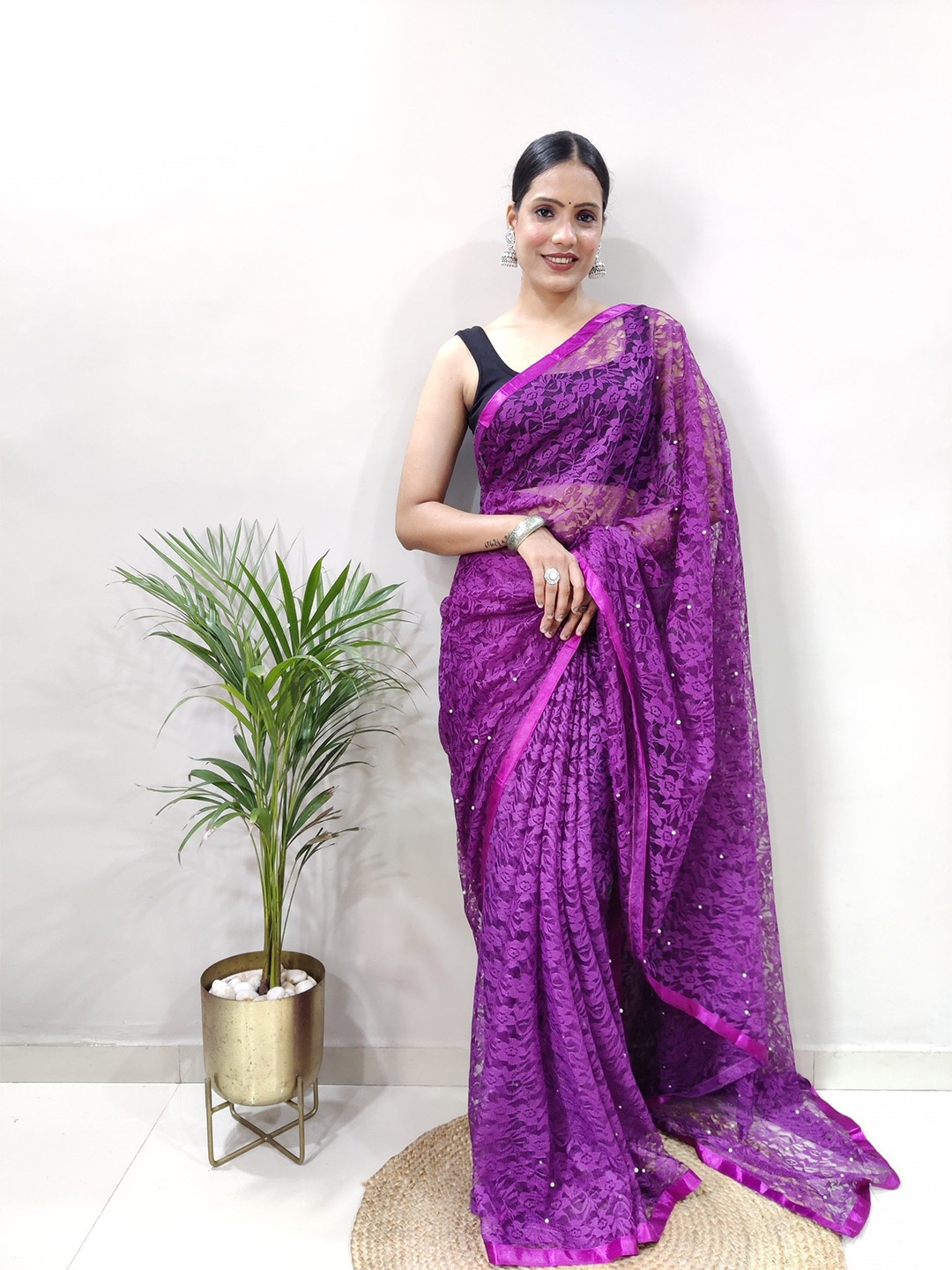 

Rangtulika Ethnics Floral Beads and Stones Net Saree, Purple