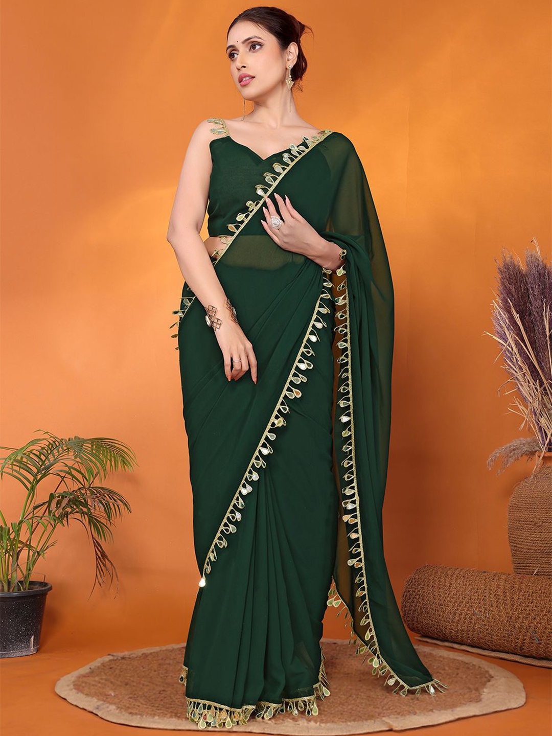 

FABMORA Embellished Mirror Work Pure Georgette Saree, Green