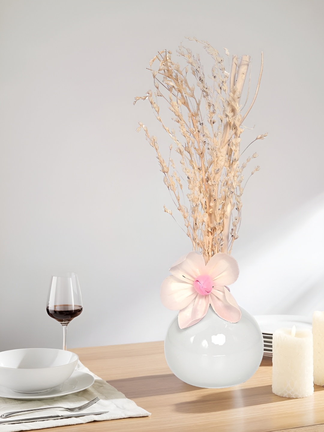 

Myntra Elegant Homes White Textured Ceramic FlowerVases