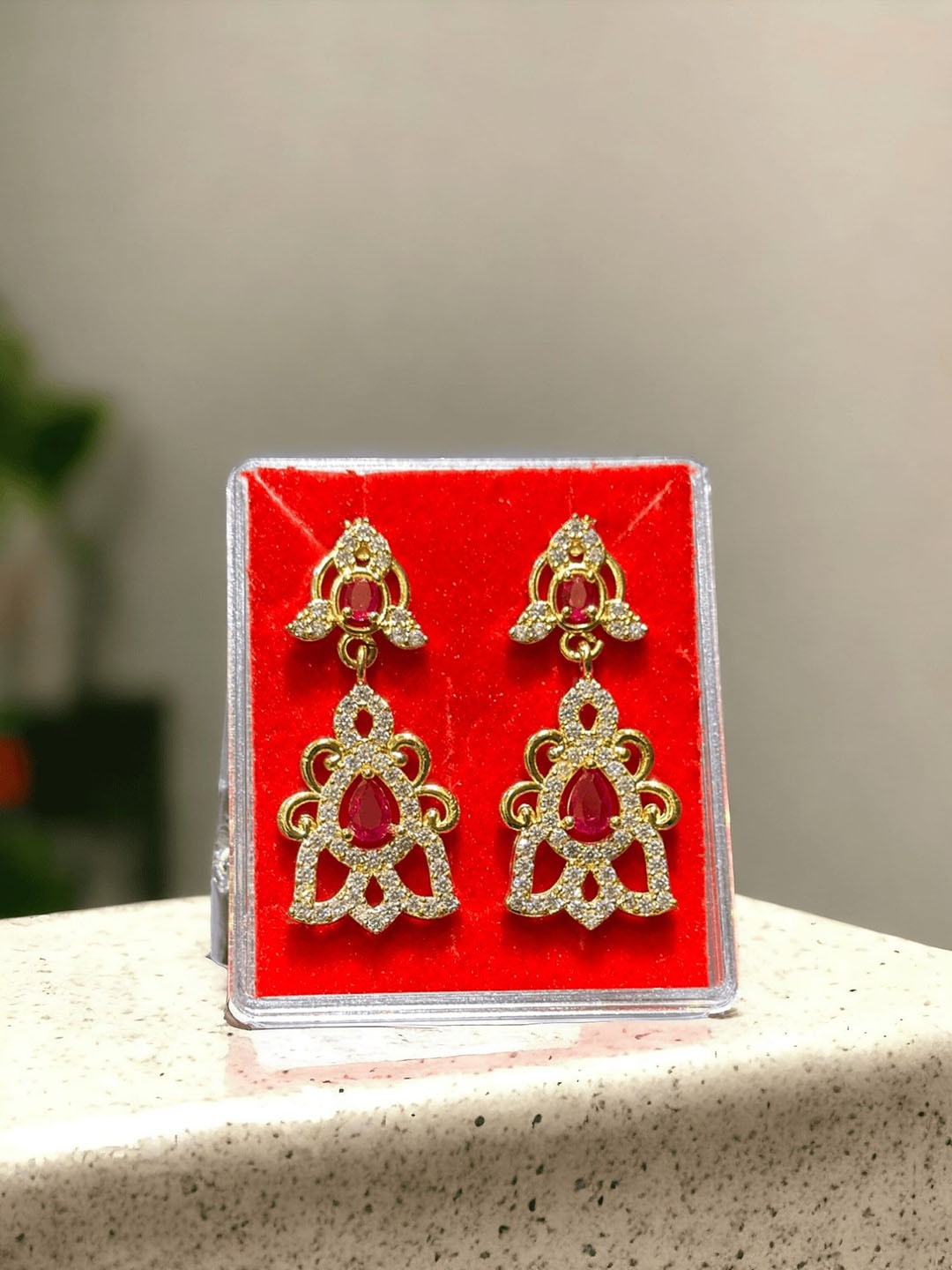 

Anouk Gold Plated Artificial Stones Studded And Beaded Geometric Drop Earrings