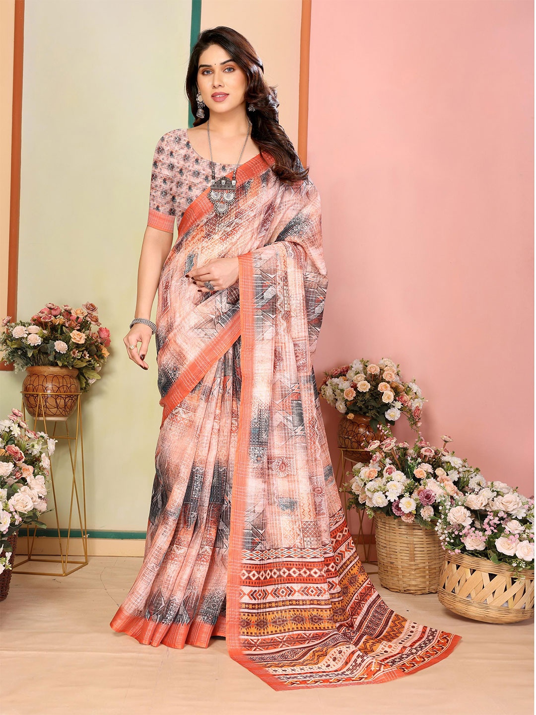 

Moda Rapido Floral Linen Blend Chanderi Saree, Orange