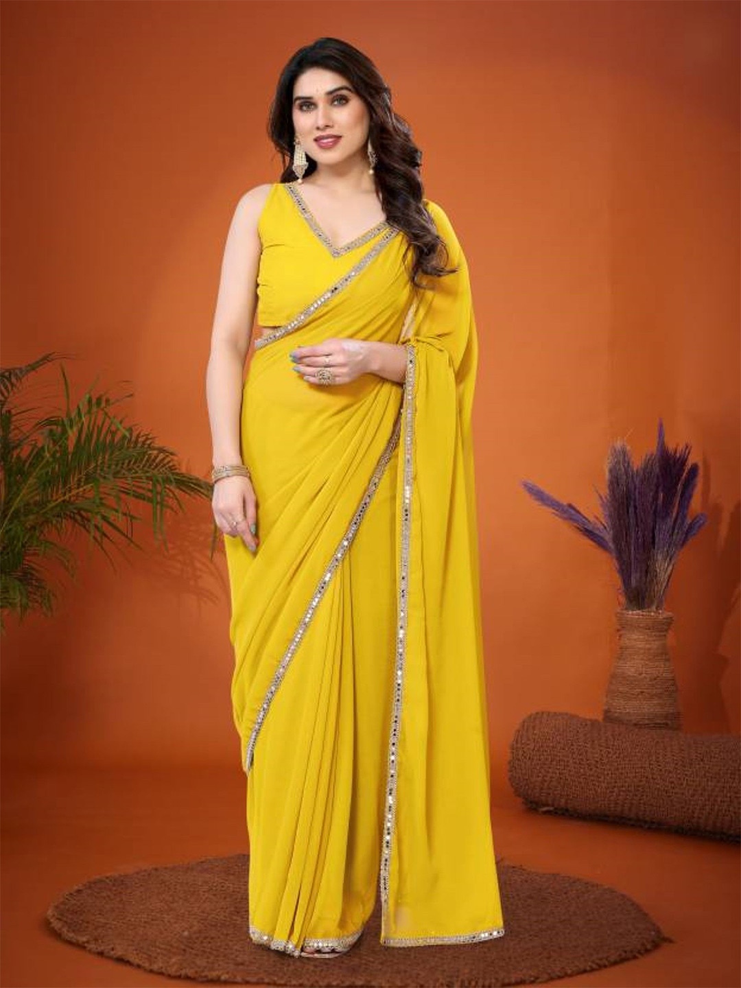 

Panzora Mirror Work Poly Georgette Saree, Yellow