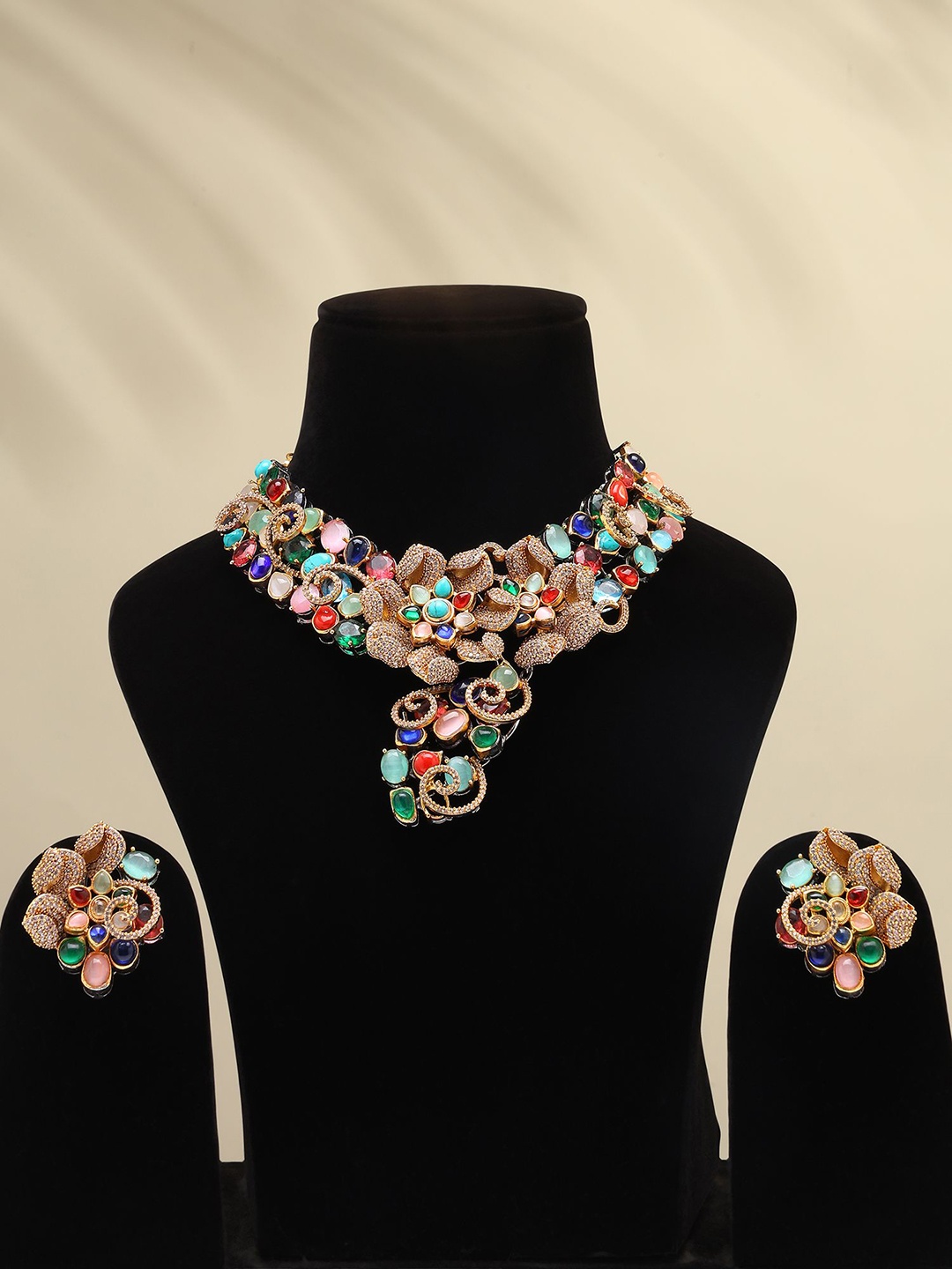 

Exotic India Designer Floral Design Choker Necklace Set With Earrings, Gold