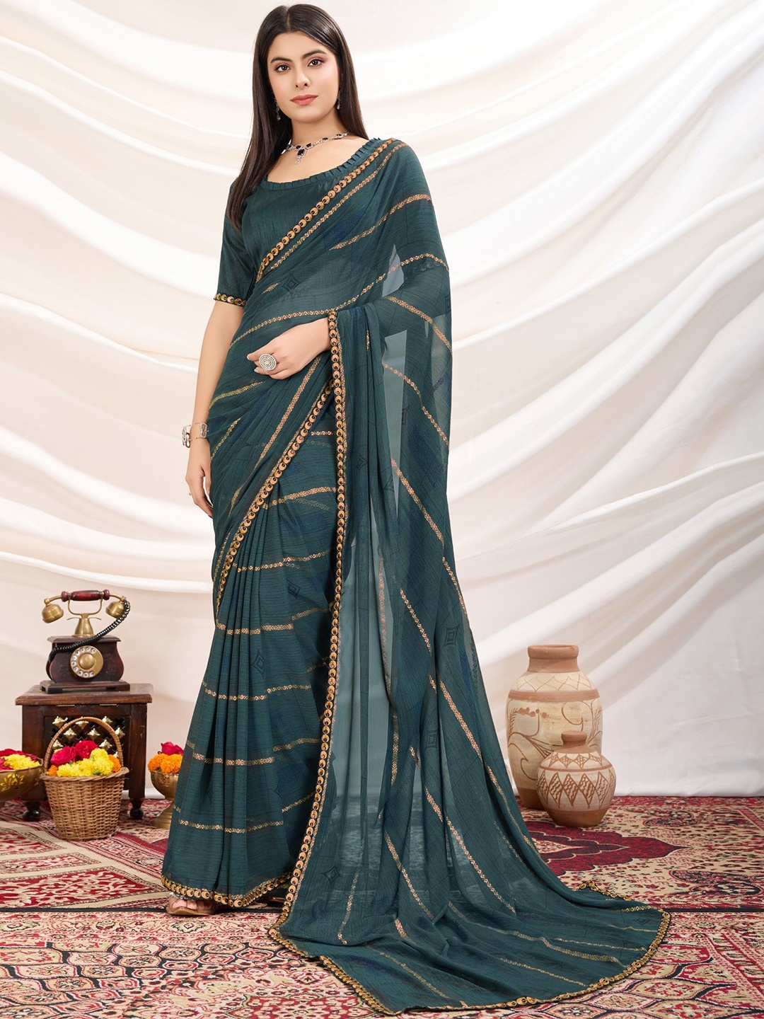 

Panzora Embellished Zari Poly Georgette Saree, Teal