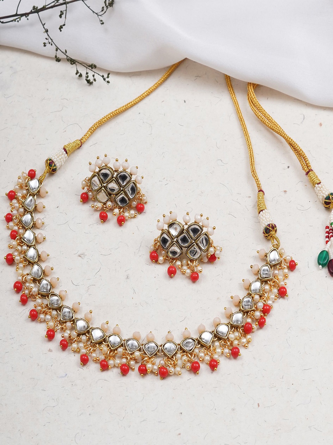 

BeAbhika Gold-Plated Stone Studded & Beaded Jewellery Set