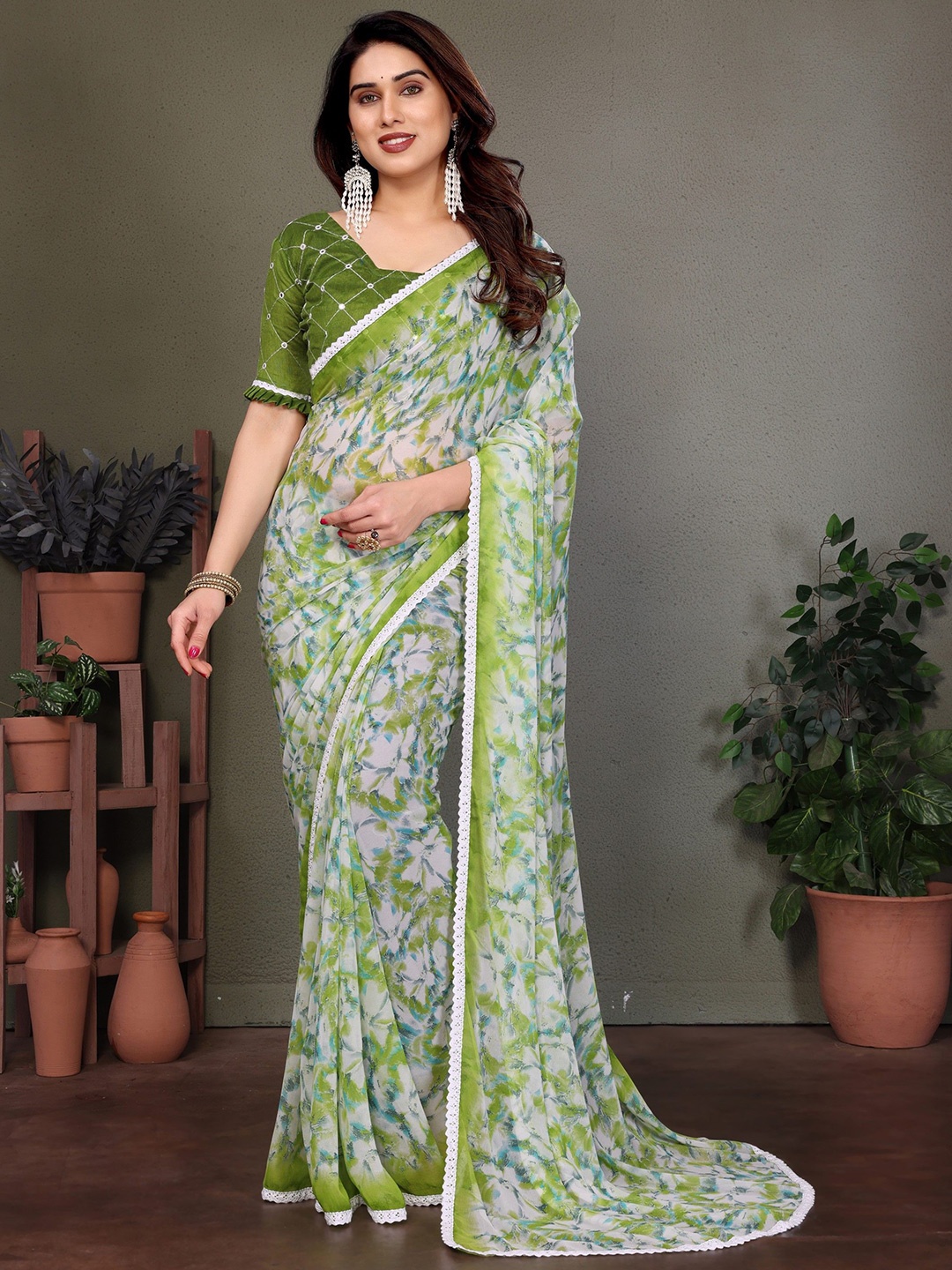 

Moda Rapido Floral Pure Georgette Saree, Green