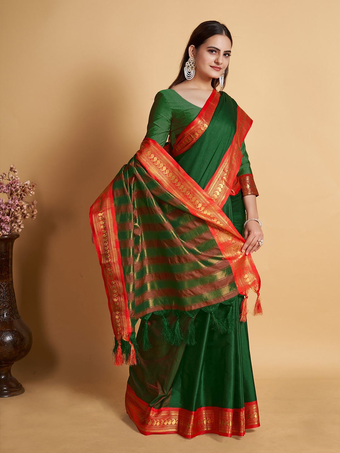 

Rangtulika Ethnics Woven Design Zari Silk Blend Saree, Green