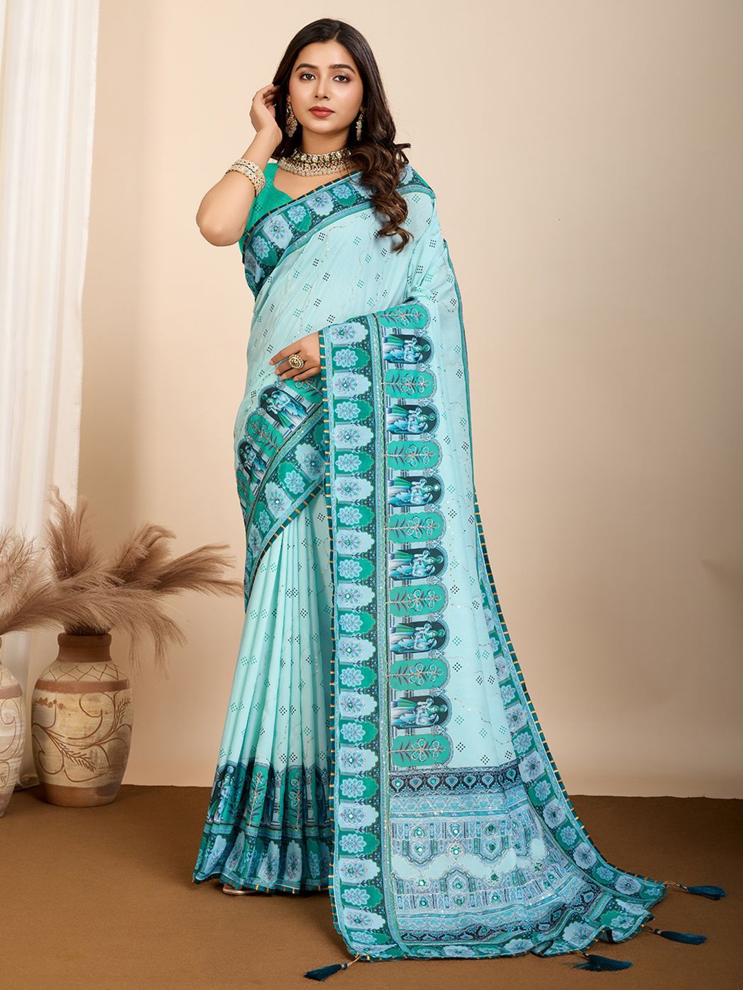

Rangtulika Ethnics Ethnic Motifs Embroidered Saree, Blue