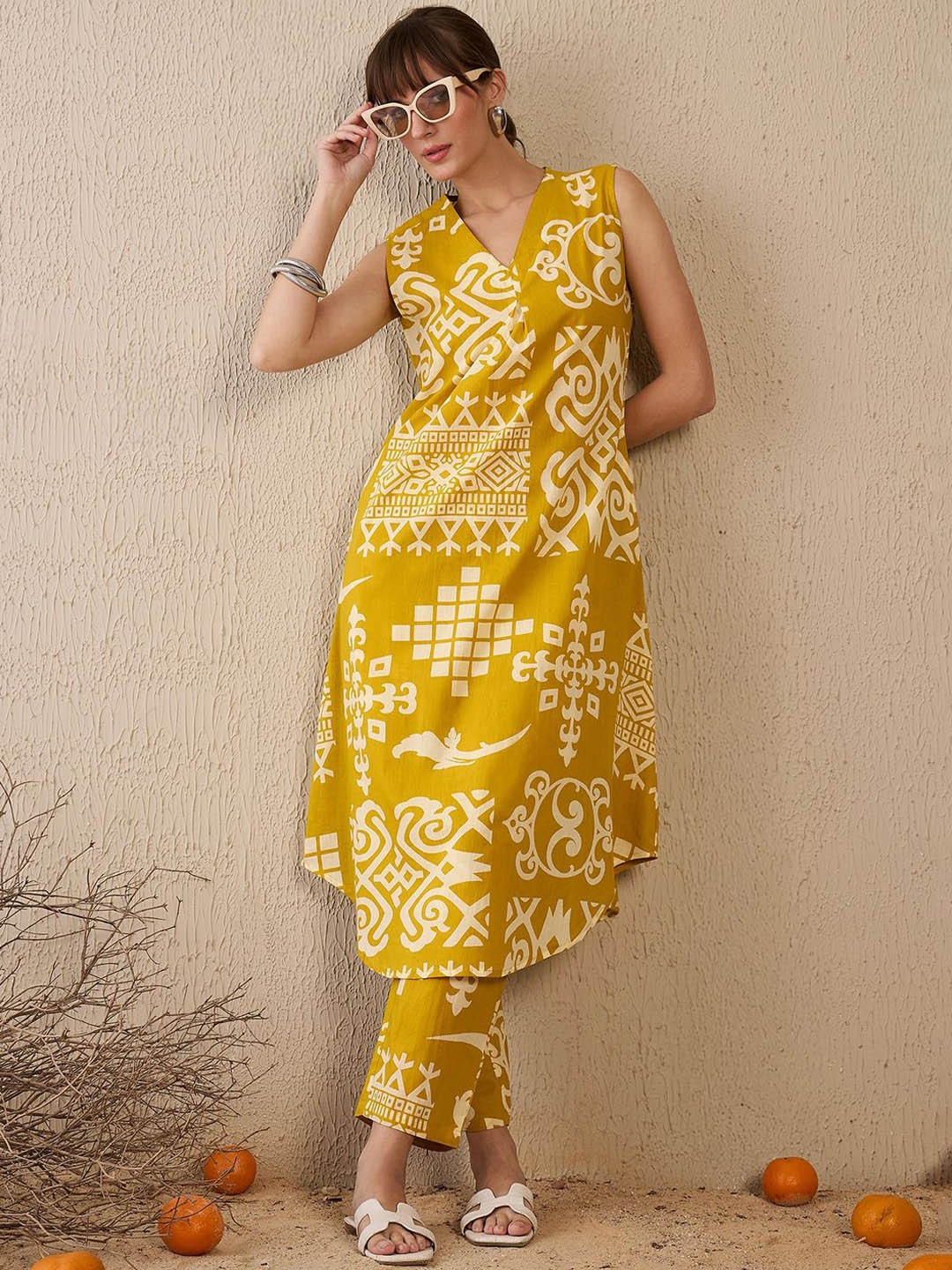 

Indo Era Women Ethnic Motifs Printed Regular Pure Cotton Kurta with Trousers, Mustard