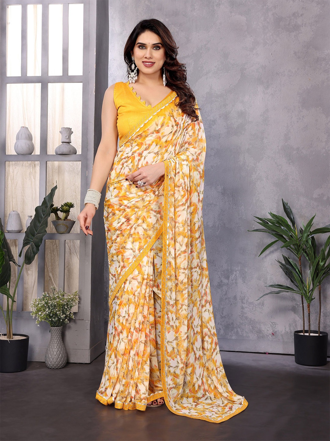 

Moda Rapido Floral Embroidered Pure Georgette Saree, Yellow