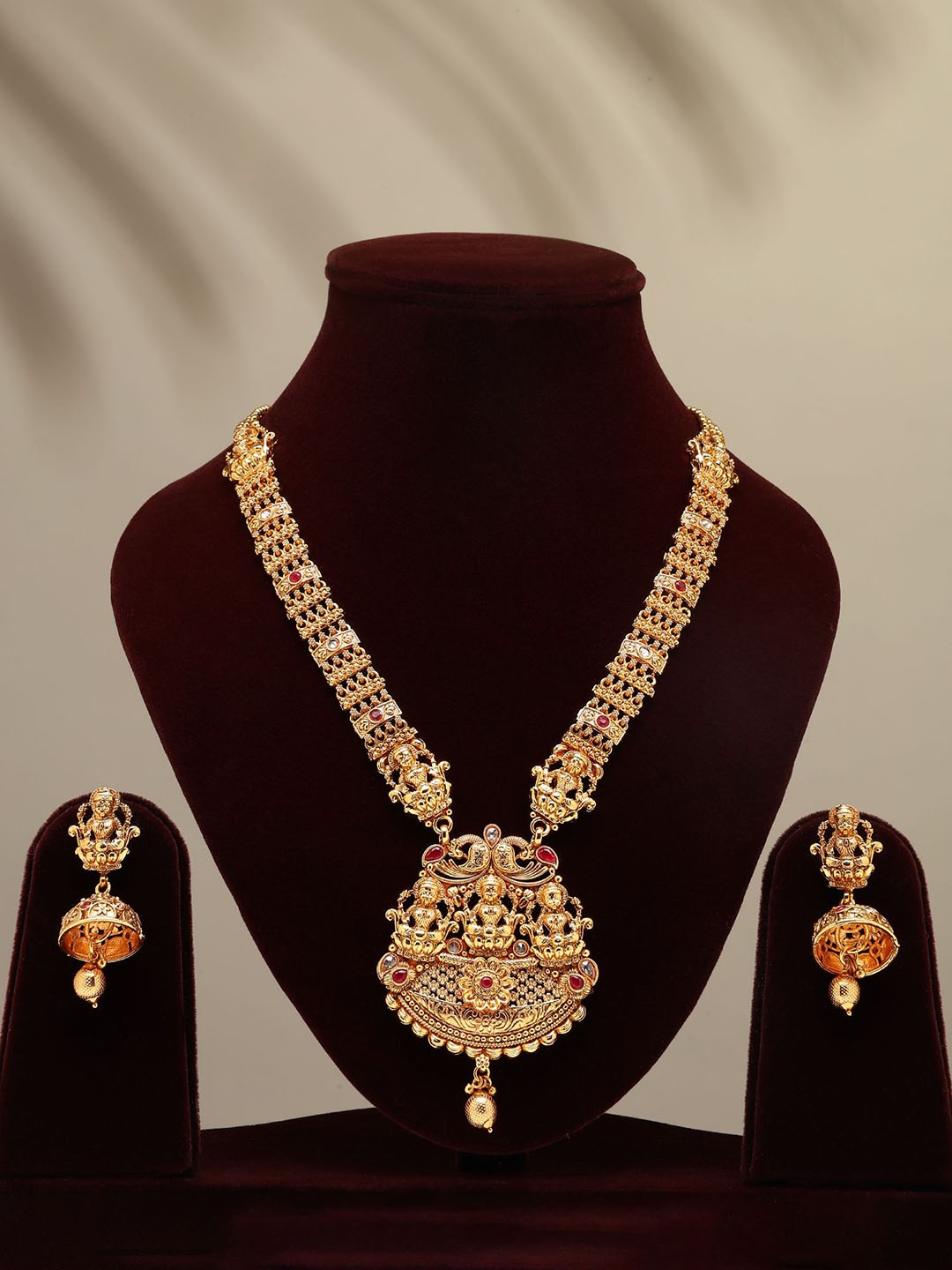 

Exotic India Trio Goddess Lakshmi Long Necklace Set With Earrings, Gold