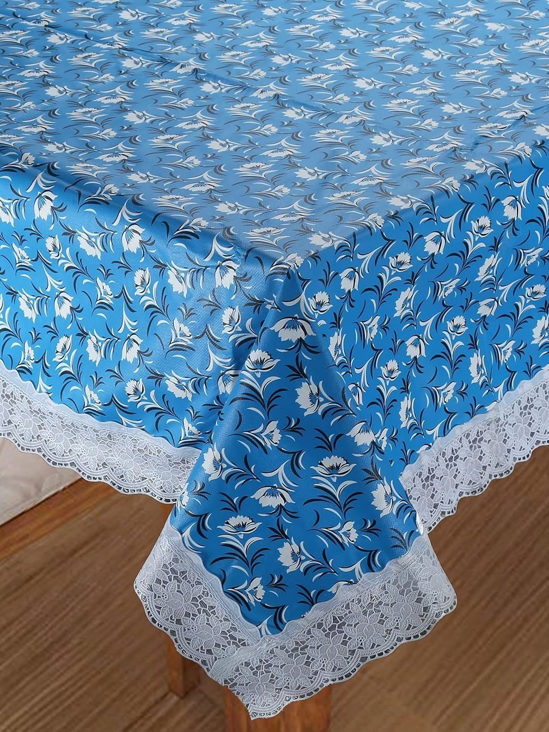 

Homerz Blue Floral Waterproof Plastic 4-Seater Table Cover