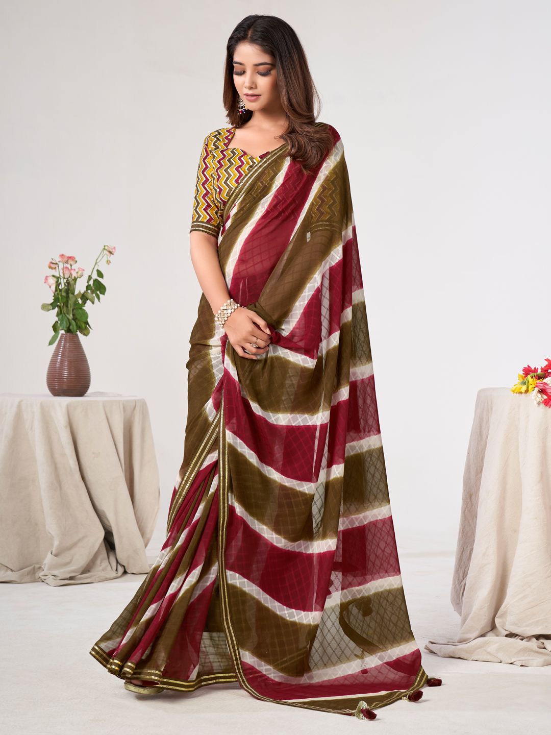 

LeeliPeeri Designer Leheriya Gotta Patti Poly Georgette Saree, Maroon