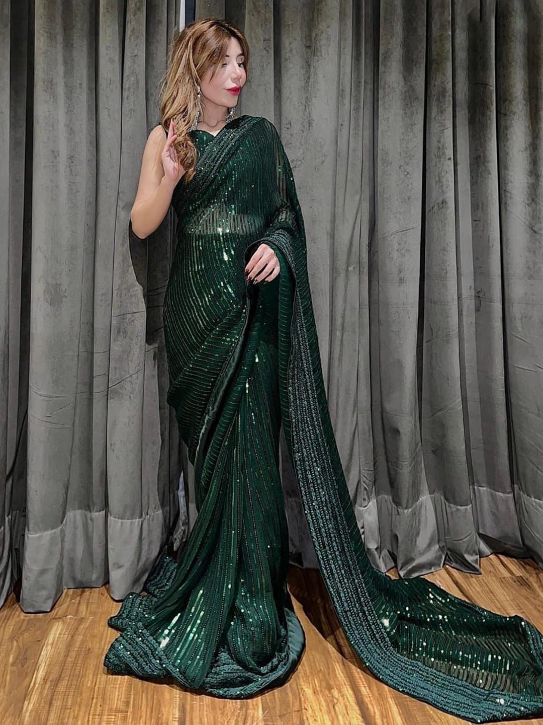 

PAYAL CREATION Embellished Sequinned Pure Georgette Saree, Green