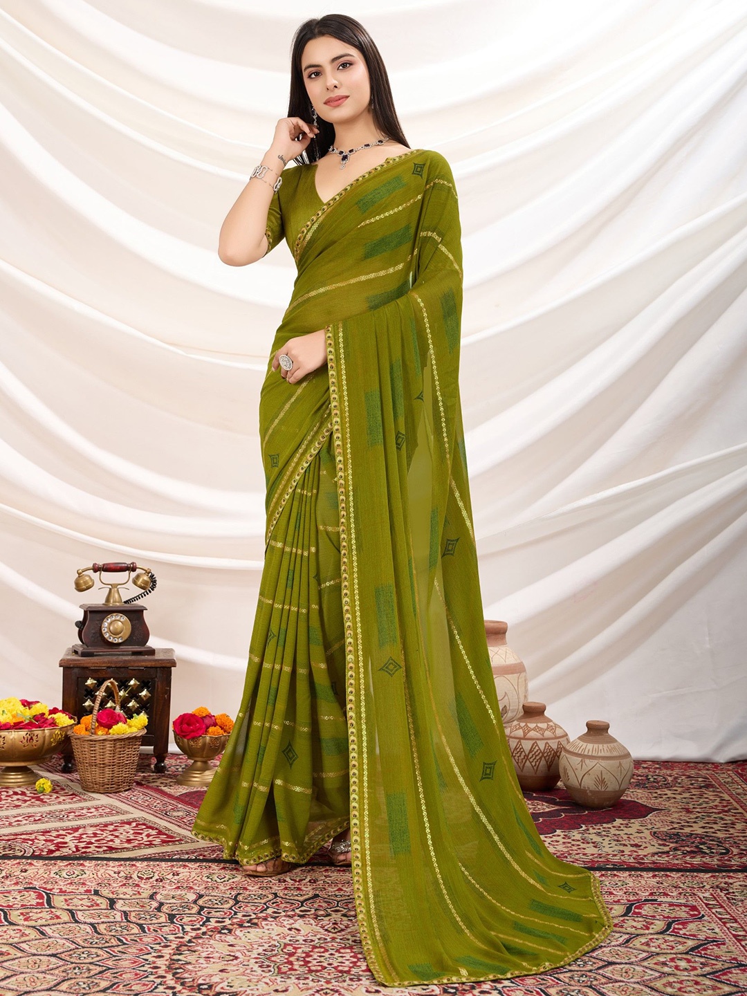 

Panzora Striped Zari Poly Georgette Saree, Green
