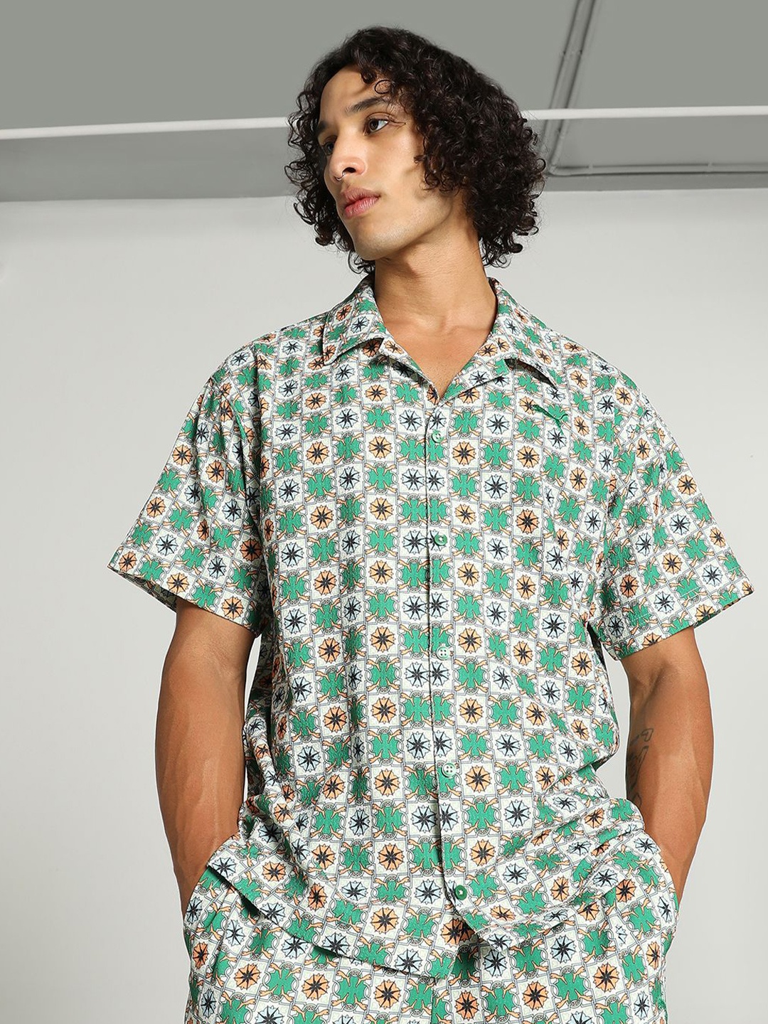 

Puma Classic Graphic Printed Relaxed Fit Short Sleeve Shirt, Green