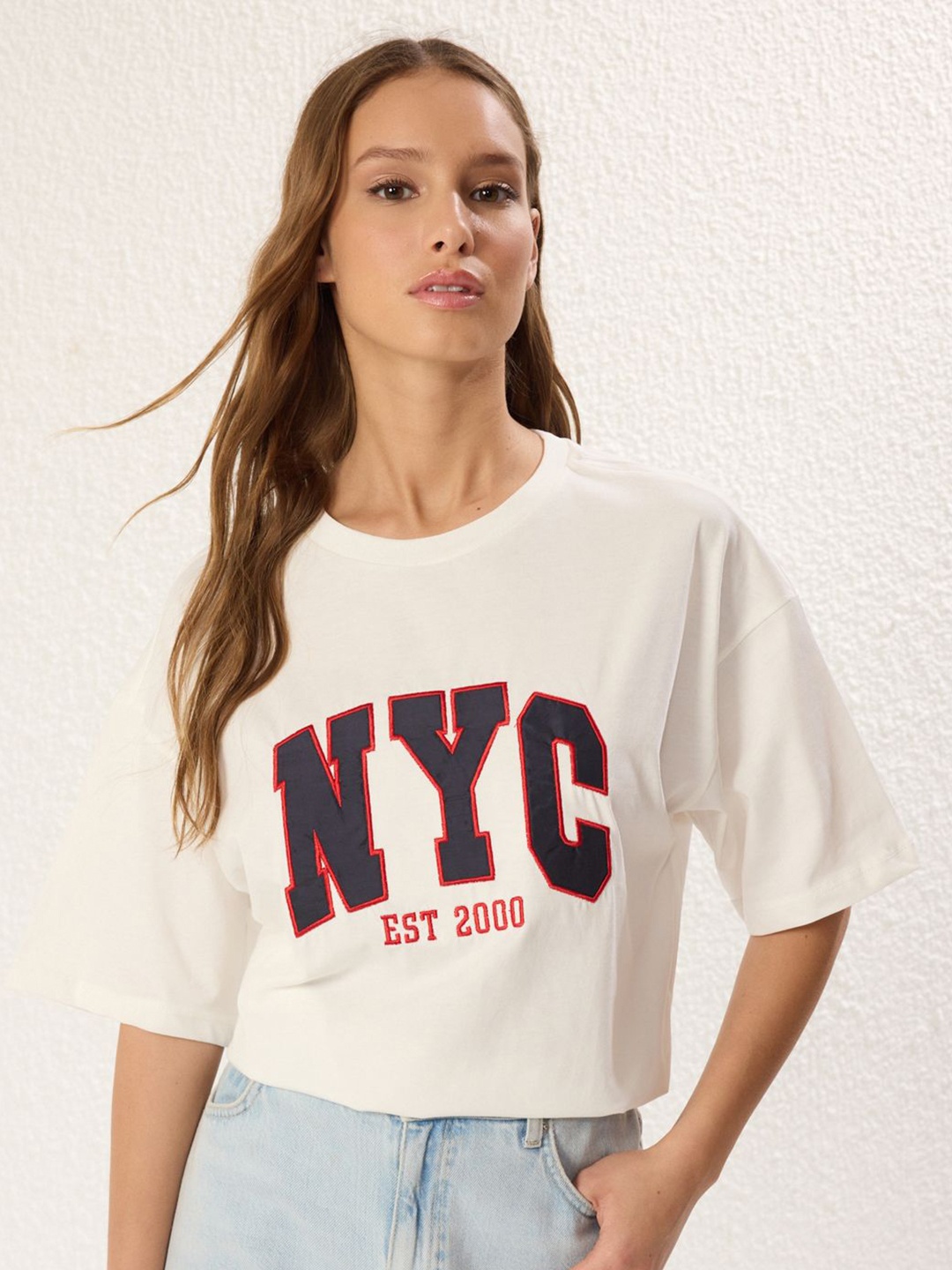 

Trendyol Women Printed Drop-Shoulder Sleeves T-shirt, Na