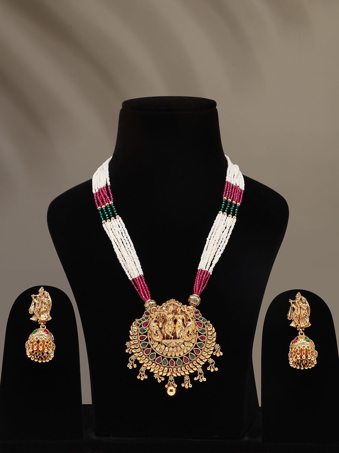 

Exotic India Multi Strand Radha Krishna Necklace & Earrings Set, Gold