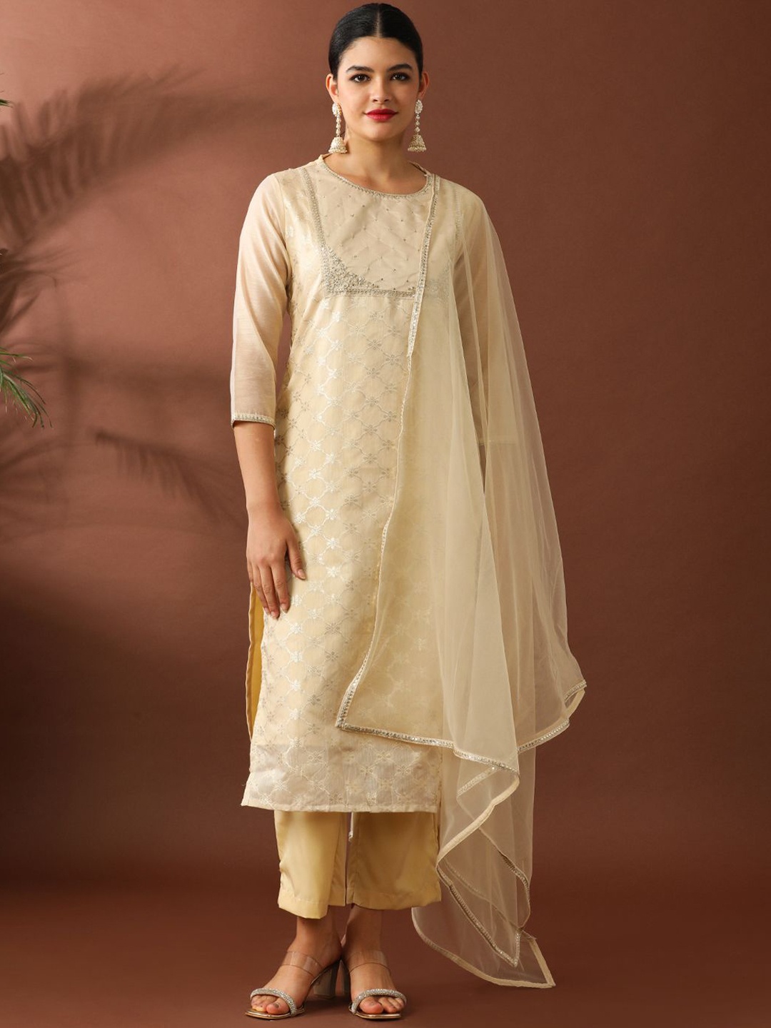 

Jaipur Kurti Women Floral Embroidered Regular Sequinned Chanderi Cotton Kurta with Trousers & With Dupatta, Cream