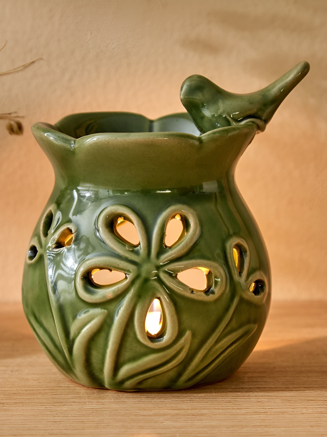 

Home Centre Garnet Serene Green & Beige Glossy Ceramic Bird Oil Burner