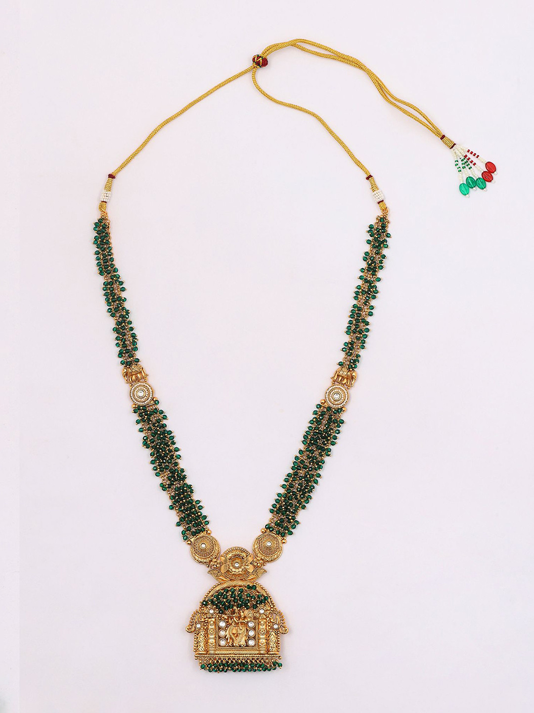 

Exotic India Radha Krishna Long Temple Necklace & Earring Set With Green Beads, Gold