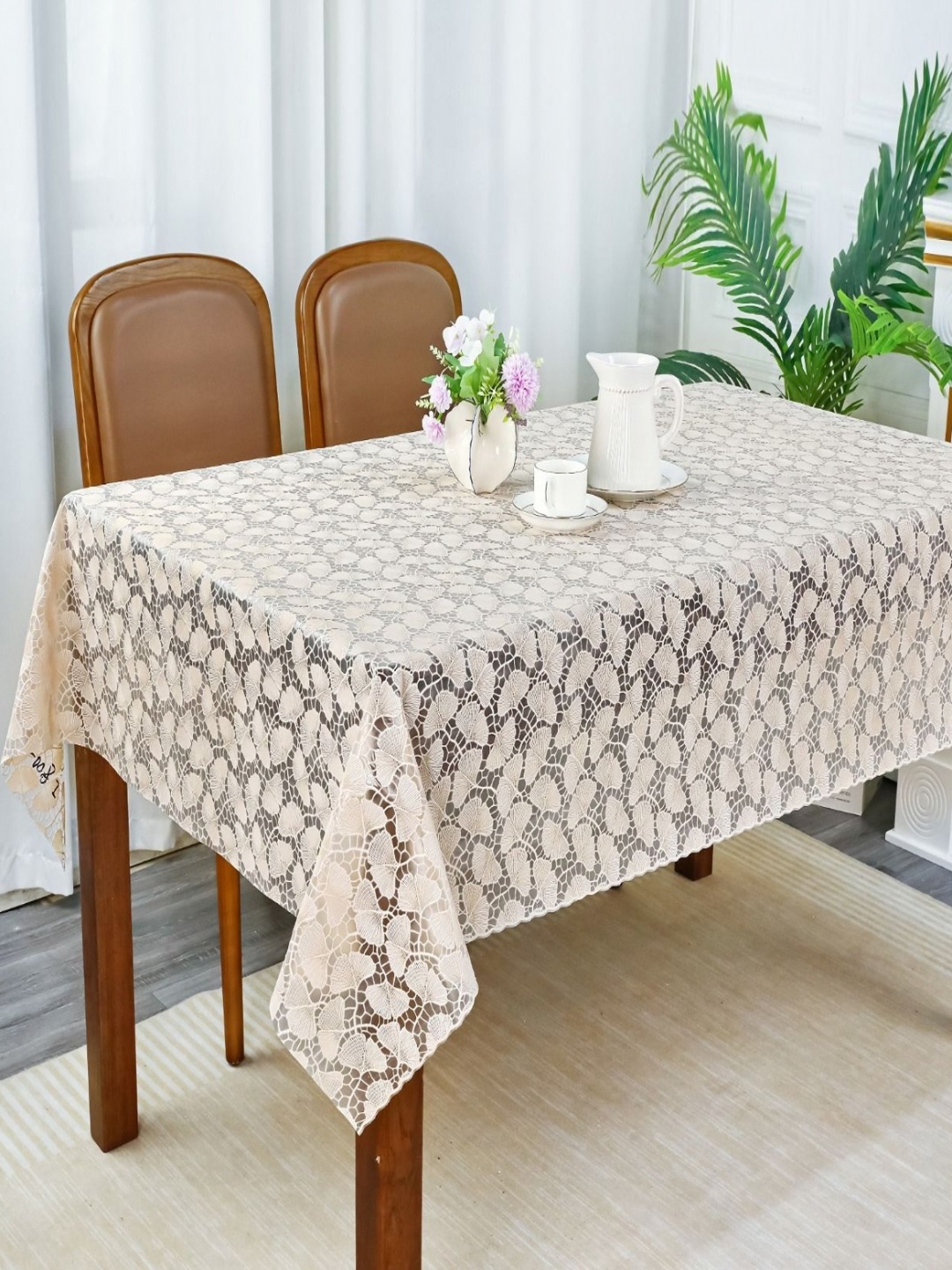 

Dakshya Industries Beige Floral Waterproof Plastic 6-Seater Table Cover