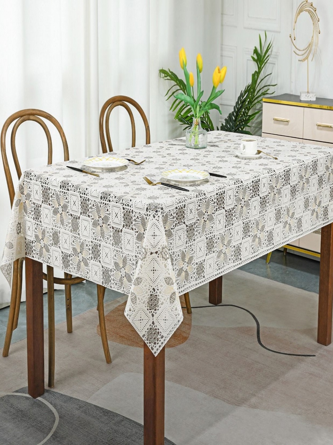 

Dakshya Industries White Floral Waterproof Plastic 6-Seater Table Cover