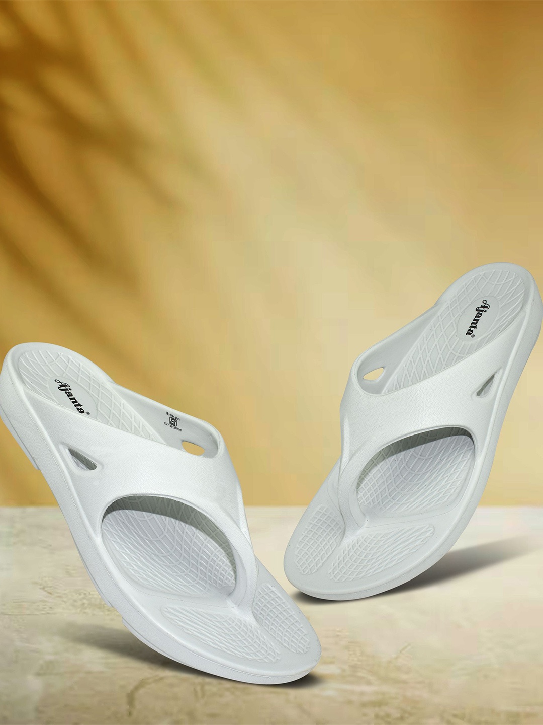 

Ajanta Men Thong Flip-Flops, White