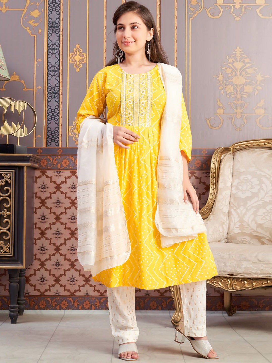 

Aarika Girls Floral Printed Flared Sleeves Thread Work Kurta, Yellow