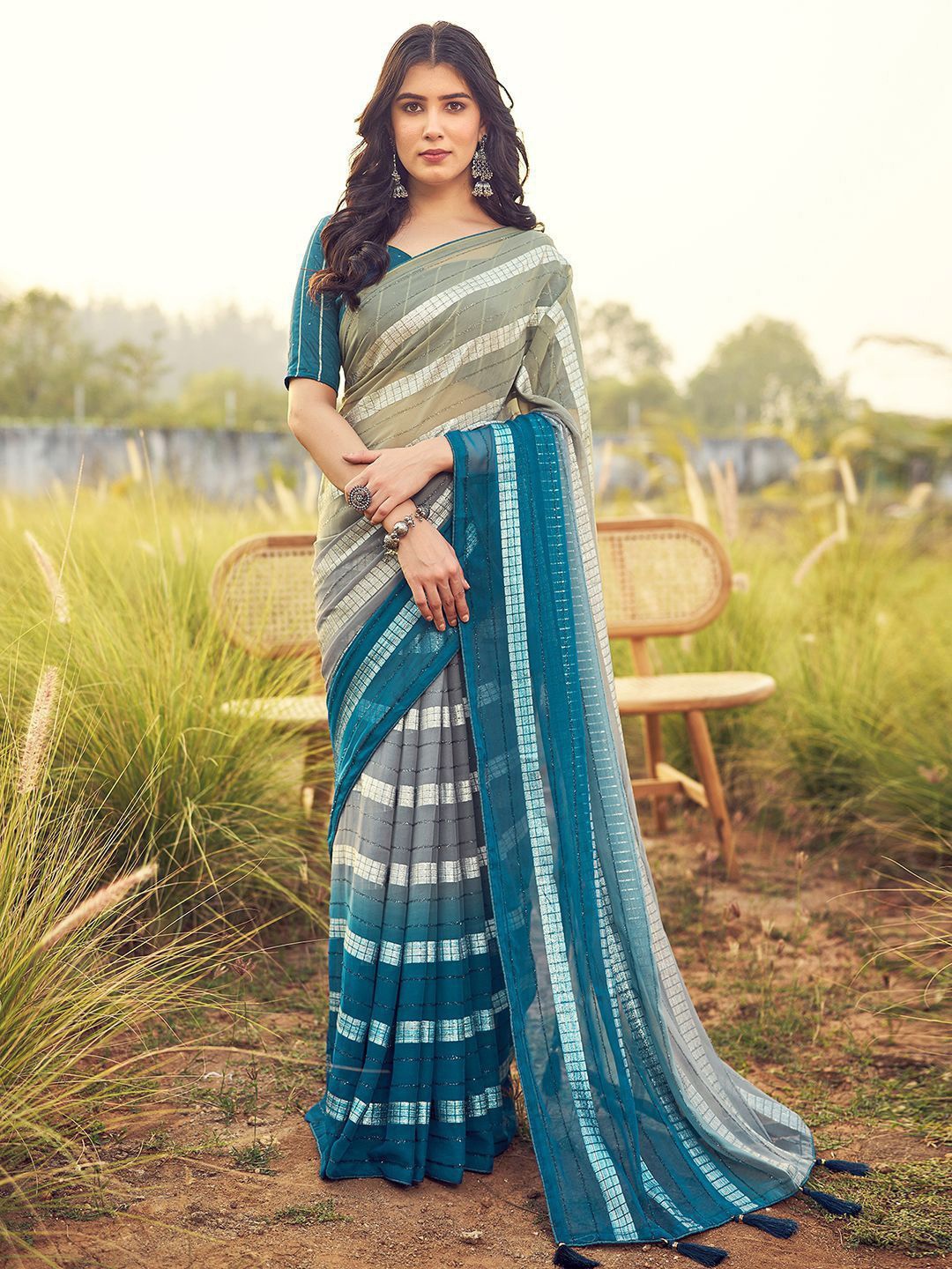 

DIVASTRI Striped Pure Georgette Saree, Teal