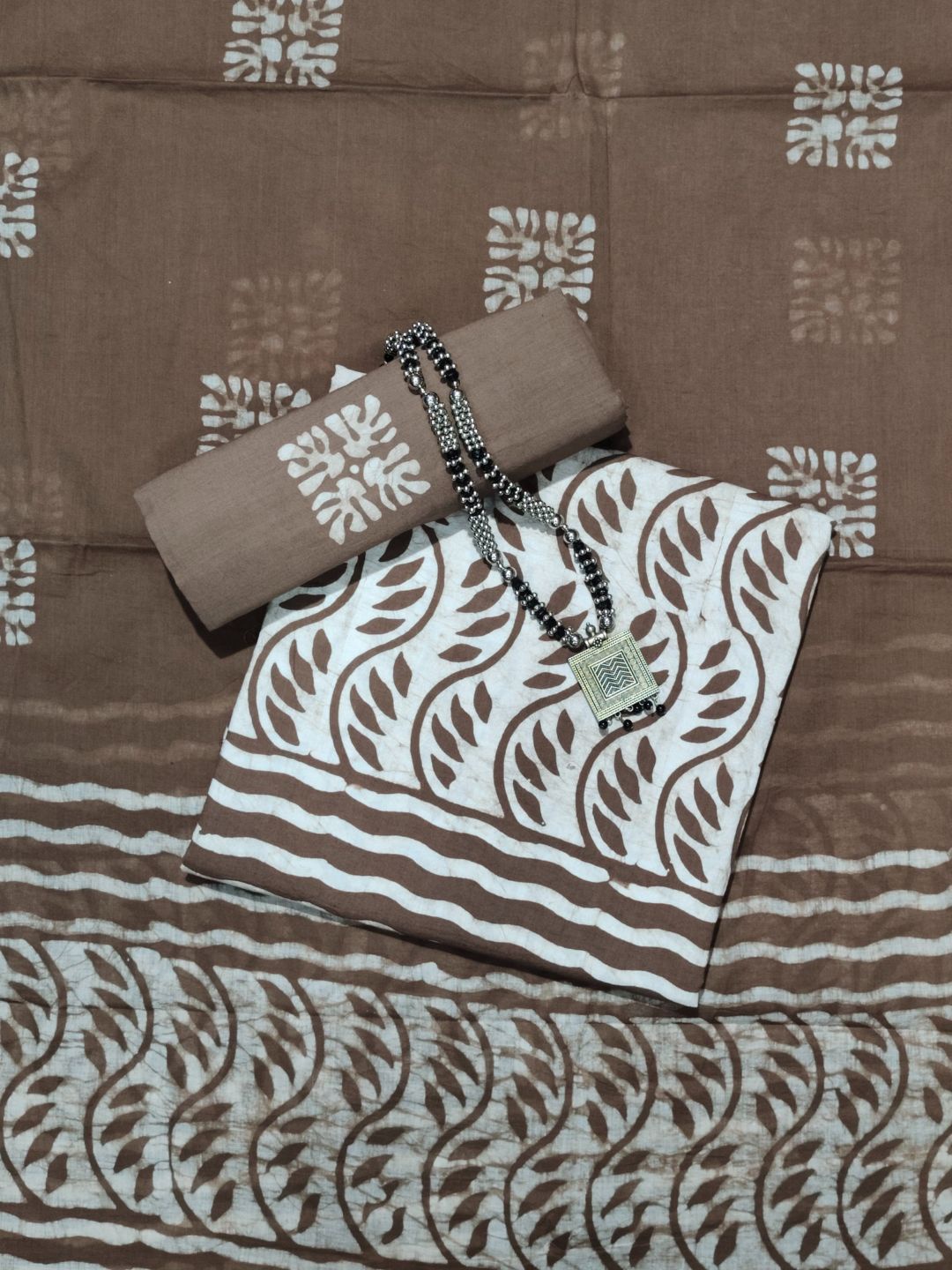 

Farooq Dyeing Printed Pure Cotton Unstitched Dress Material, Brown